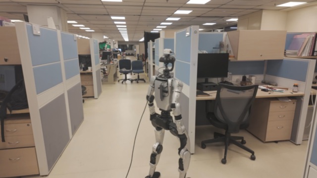 A humanoid robot navigating to a refrigerator
